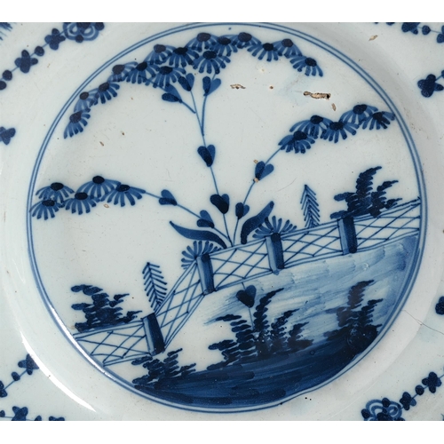 570 - SIX ENGLISH DELFT POLYCHROME AND BLUE AND WHITE PLATESVARIOUS DATES THIRD QUARTER 18TH CENTURYCompri... 