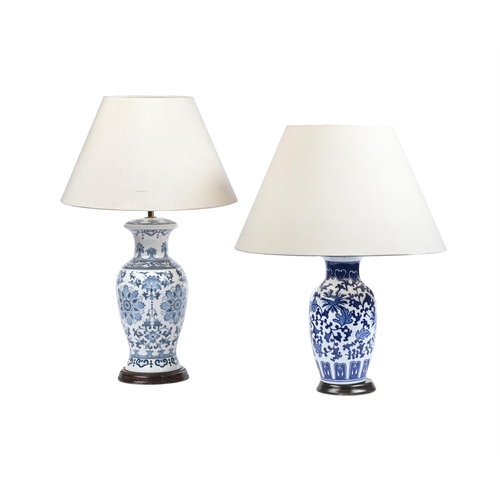 571 - TWO BLUE AND WHITE LAMPS IN CHINESE STYLE MODERN44 and 36cm high respectively including fitments