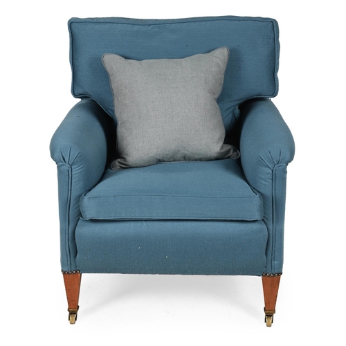 573 - A MAHOGANY AND BLUE UPHOLSTERED ARMCHAIR IN THE MANNER OF HOWARD & SONS, EARLY 20TH CENTURYOn square... 