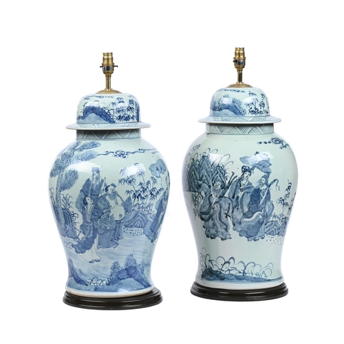 575 - A PAIR OF BLUE AND WHITE PORCELAIN TABLE LAMPSIN CHINESE STYLEapproximately 79cm high, 28cm wide, 28... 