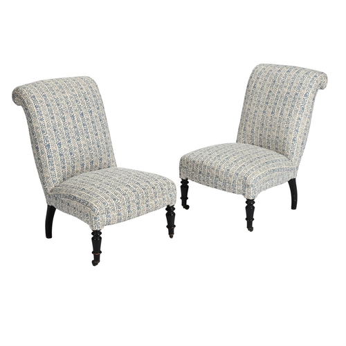 576 - A PAIR OF NAPOLEON III NURSING CHAIRS CIRCA 1870 Upholstered in natural linen with indigo block prin... 