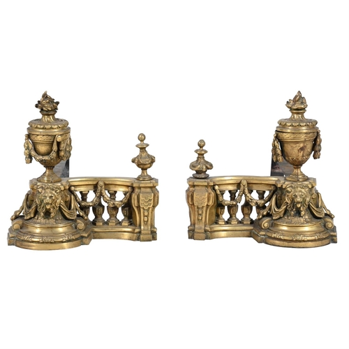 587 - A PAIR OF BRASS ANDIRONSIN RÉGENCE STYLE, 20TH CENTURYWith wrought iron struts39cm high, 50cm wide, ... 