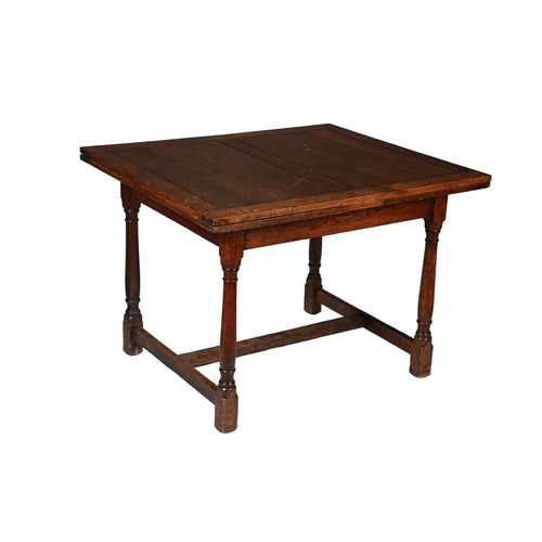 543 - AN OAK DRAWER LEAF DINING TABLEBY HEALS, CIRCA 192076.5cm high, 90.5cm wide, 198cm long extended