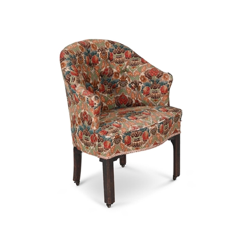 554 - A GEORGE III MAHOGANY TUB ARMCHAIRSECOND HALF 18TH CENTURYUpholstered in printed linen79cm high, 63c... 