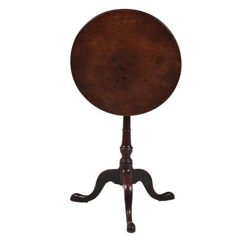 555 - A GEORGE III MAHOGANY OCCASIONAL TABLECIRCA 1800 70cm high, 50cm diameter