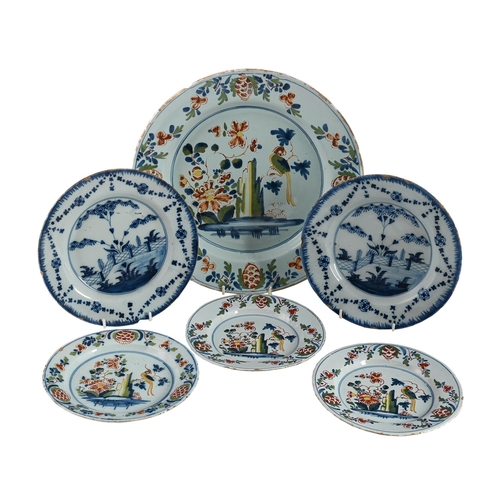 570 - SIX ENGLISH DELFT POLYCHROME AND BLUE AND WHITE PLATESVARIOUS DATES THIRD QUARTER 18TH CENTURYCompri... 