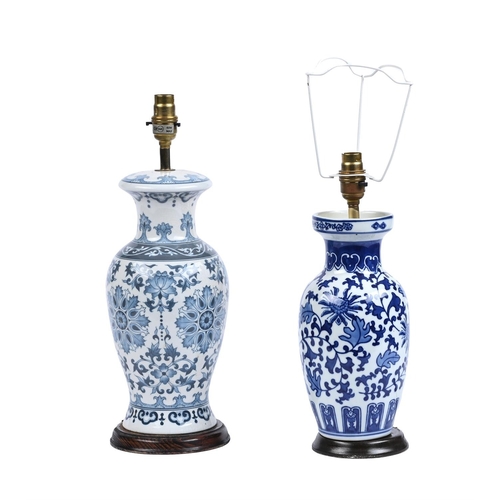 571 - TWO BLUE AND WHITE LAMPS IN CHINESE STYLE MODERN44 and 36cm high respectively including fitments