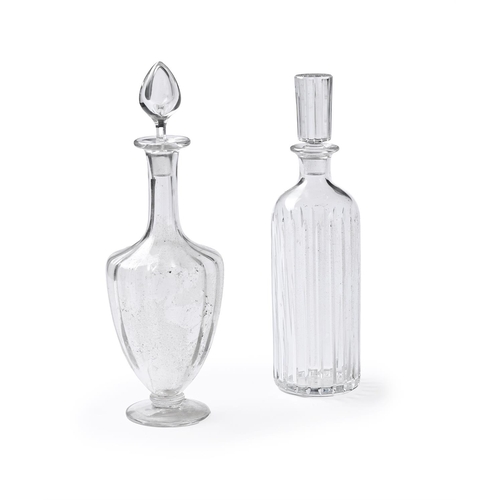 593 - TWO BACCARAT CLEAR GLASS DECANTERS AND STOPPERS MODERNEach with engraved marks one of fluted cylindr... 