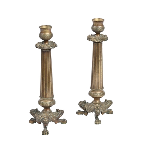 305 - A PAIR OF FRENCH ORMULU EMPIRE STYLE CANDLESTICKSLATE 19TH CENTURYeach 25.5cm high TOGETHER WITH A G... 