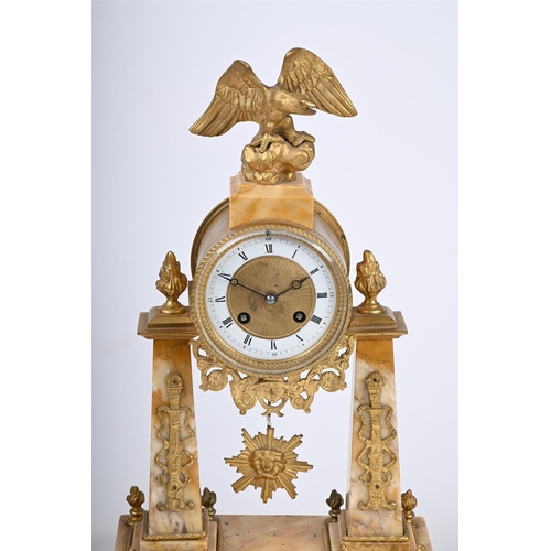 329 - A FRENCH GILT METAL AND YELLOW ALABASTER MOUNTED THREE PIECE CLOCK GARNITUREIN EMPIRE STYLE, LATE 19... 