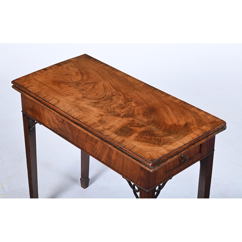 335 - A GEORGE III MAHOGANY AND CROSSBANDED TEA TABLECIRCA 178574cm high, 86cm wide, 42cm deep when closed