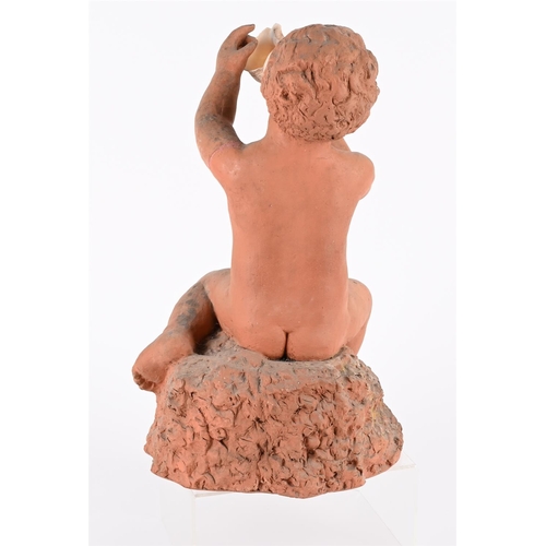 339 - A TERRACOTTA FIGURE OF A SEATED PUTTI 20TH CENTURY Stamped indistinctly to interior 48cm highTOGETHE... 