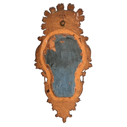 358 - AN ITALIAN CARVED GILTWOOD MIRROR18TH CENTURY83cm high, 42cm wide, 8cm deep