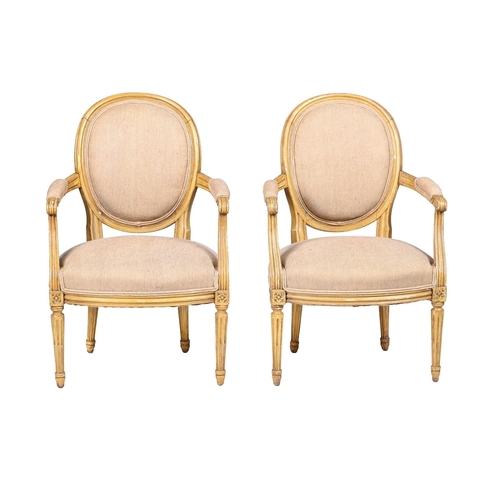 388 - A PAIR OF LOUIS XVI PAINTED AND UPHOLSTERED FAUTEUILLATE 18TH CENTURYeach 87cm high, 56cm wide, 50cm... 