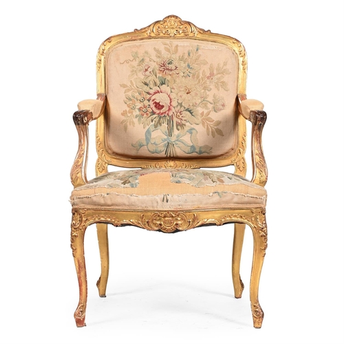 390 - A CARVED GILTWOOD AND TAPESTRY UPHOLSTERED FAUTEUIL IN REGENCE STYLE, 19TH CENTURY99cm high, 63cm wi... 