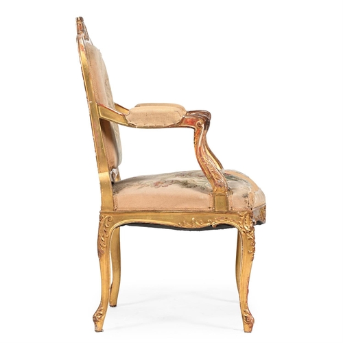 390 - A CARVED GILTWOOD AND TAPESTRY UPHOLSTERED FAUTEUIL IN REGENCE STYLE, 19TH CENTURY99cm high, 63cm wi... 