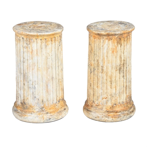 409 - A PAIR OF SHORT SIMULATED MARBLE COLUMNSLATE 19TH OR EARLY 20TH CENTURYOf fluted form each 60cm high... 