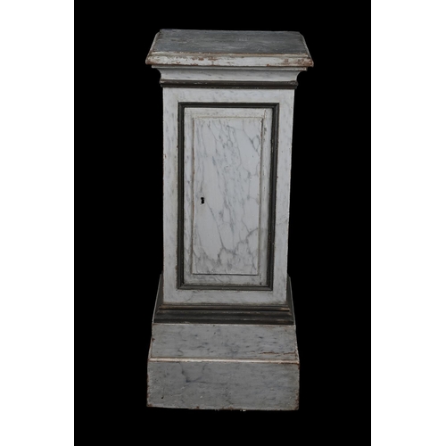 417 - A PAINTED SIMULATED MARBLE PEDESTAL CUPBOARDPROBABLY FRENCH, MID 19TH CENTURYWith single door to fro... 