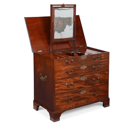 422 - A GEORGE III MAHOGANY DRESSING CHEST CIRCA 1780With hinged lift top enclosing various compartments a... 