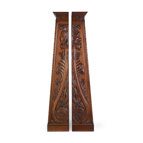 431 - A PAIR OF WALNUT OPEN BOOKCASES OF RECENT MANUFACTURE With Vitruvian scrolls to the cornice, the tap... 