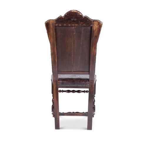 435 - A PAIR OF BAROQUE STYLE WALNUT AND EMBOSSED LEATHER SIDE CHAIRS ITALIAN, INCORPORATING SOME 17TH OR ... 