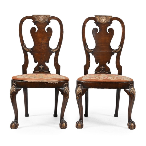 442 - A PAIR OF WALNUT AND PARCEL GILT SIDE CHAIRSIN GEORGE II STYLE, IN THE MANNER OF GILES GRENDEY, LATE... 