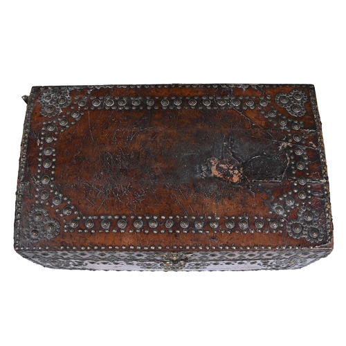 456 - A CONTINENTAL LEATHER BOUND, STUDDED AND BRASS MOUNTED BOX18TH CENTURY34cm high, 64cm wide, 39cm dee... 