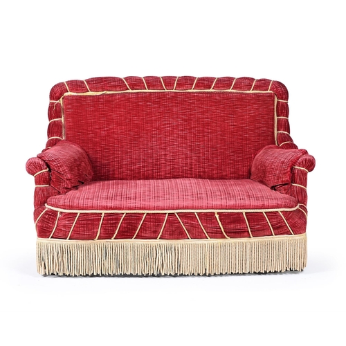 458 - A FRENCH EBONISED AND UPHOLSTERED SOFA LATE 19TH CENTURYWith red velvet upholstery and cream rope-pi... 