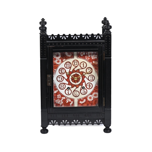 462 - AN AESTHETIC MOVEMENT EBONISED MANTEL CLOCK CIRCA 1880With gong-striking movement, serial stamped JW... 