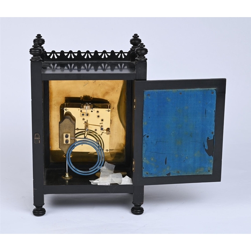 462 - AN AESTHETIC MOVEMENT EBONISED MANTEL CLOCK CIRCA 1880With gong-striking movement, serial stamped JW... 