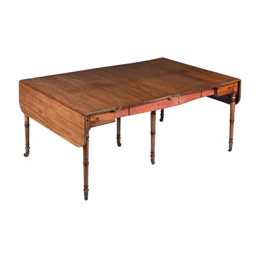 482 - A REGENCY MAHOGANY DROP LEAF EXTENDING DINING TABLE CIRCA 1820Extending with a concertina action, wi... 