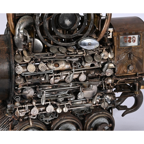 880 - SONNY DALTON (AMERICAN, 1933-2011), A MIXED METAL MODEL OF A STEAM ENGINE SIGNED AND DATED 1987Forme... 