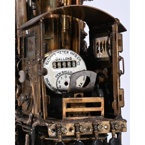 880 - SONNY DALTON (AMERICAN, 1933-2011), A MIXED METAL MODEL OF A STEAM ENGINE SIGNED AND DATED 1987Forme... 