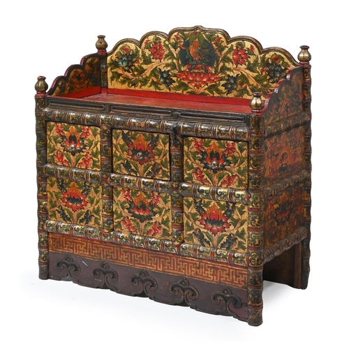 602 - A POLYCHROME PAINTED SIDE CABINET DECORATED WITH FLORAL FOLIATE SCROLLSTIBETAN, 18TH OR 19TH CENTURY... 