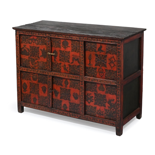 606 - A CINNABAR LACQUERED SIDE CABINET With two pairs of cupboard doors enclosing a compartment interior ... 