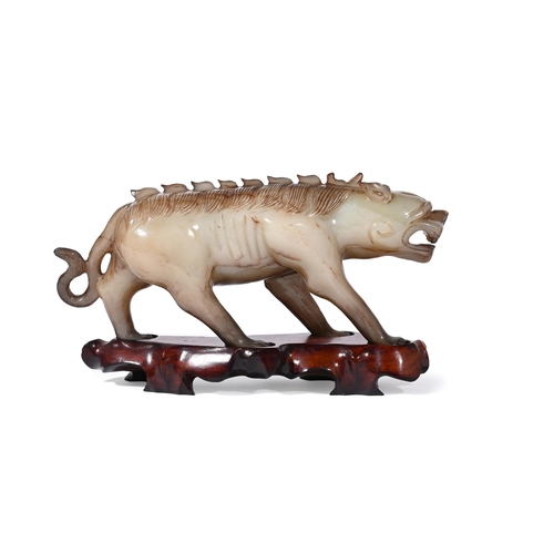 627 - A CHINESE JADE CARVING OF A RAM20TH CENTURYRecumbent with curved horns approximately 15cm high, 27cm... 