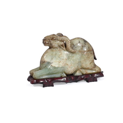 627 - A CHINESE JADE CARVING OF A RAM20TH CENTURYRecumbent with curved horns approximately 15cm high, 27cm... 