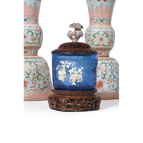 633 - A PAIR OF CHINESE ENAMEL GLASS VASES20TH CENTURYWith flared necks and painted in colours with scroll... 