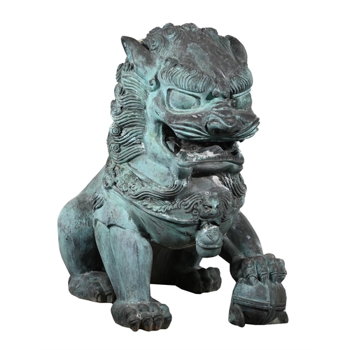 646 - A VERY LARGE PAIR OF PATINATED METAL GARDEN MODELS OF CHINESE GUARDIAN LIONS OR FOO DOGS20TH CENTURY... 