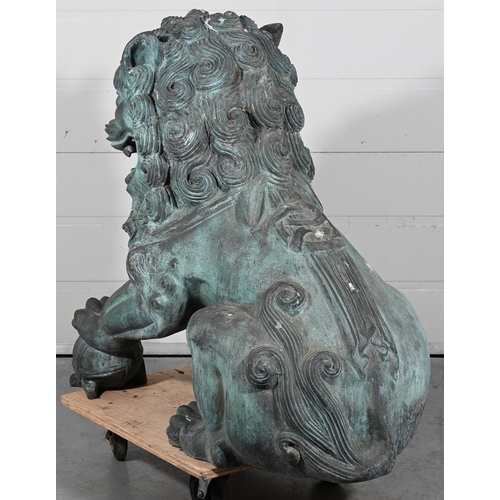 646 - A VERY LARGE PAIR OF PATINATED METAL GARDEN MODELS OF CHINESE GUARDIAN LIONS OR FOO DOGS20TH CENTURY... 