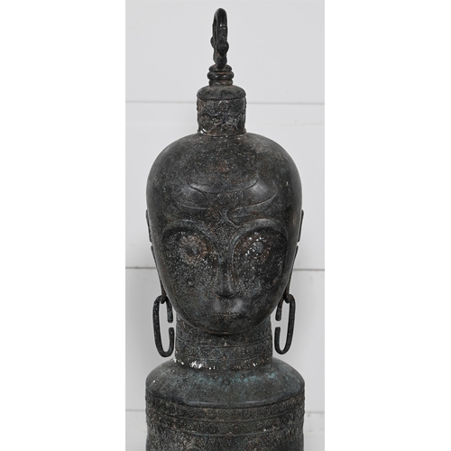 649 - A PAIR OF THAI VERDIGRIS PATINATED BRONZE SLIT DRUMSModelled with a Buddha head atop of a columnar b... 