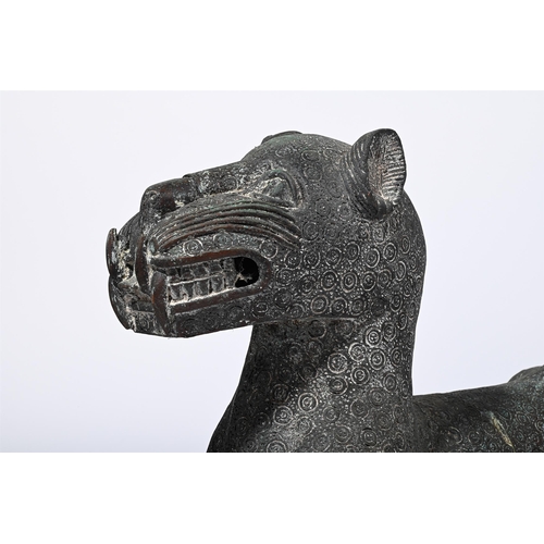 651 - A PAIR OF PATINATED METAL GARDEN MODELS OF CATS IN THE BENIN MANNER, 20TH CENTURY each approximately... 