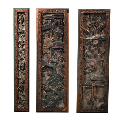 655 - A SET OF TWELVE CHINESE CARVED PAINTED PANELSQIANLONG, 1736-1795each panel approximately 142cm high,... 