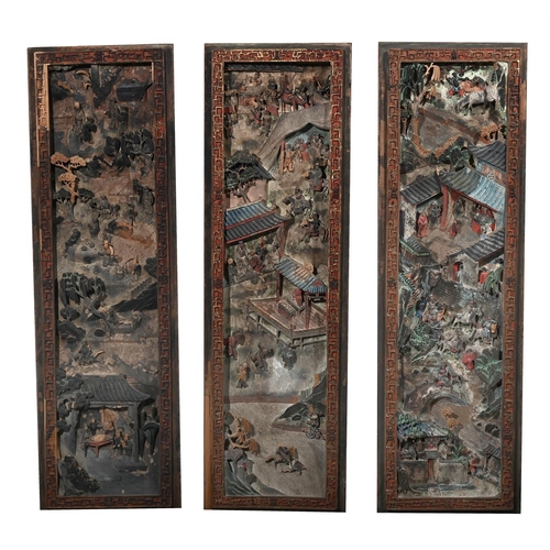 655 - A SET OF TWELVE CHINESE CARVED PAINTED PANELSQIANLONG, 1736-1795each panel approximately 142cm high,... 