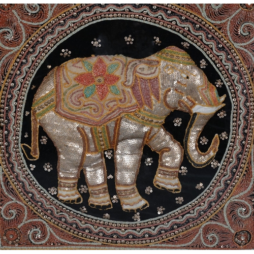 685 - THREE VARIOUS THAI EMBROIDERED PANELS20TH CENTURYComprising a pair depicting elephants and the other... 