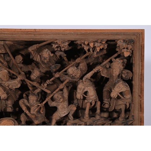 700 - A GROUP OF FOUR CHINESE CARVED WOOD DISPLAY PANELS DEPICTING BATTLES 20TH CENTURY each approximately... 