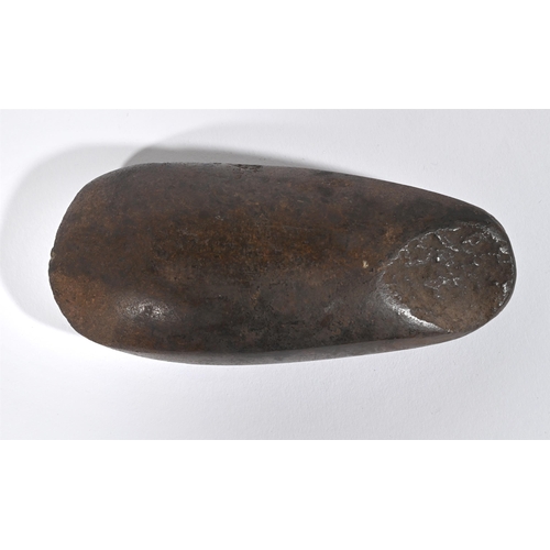 708 - A STONE AXE HEAD BLADE POSSIBLY AUSTRALASIAN approximately 6cm high, 13cm wide, 3cm deepProvenance:P... 