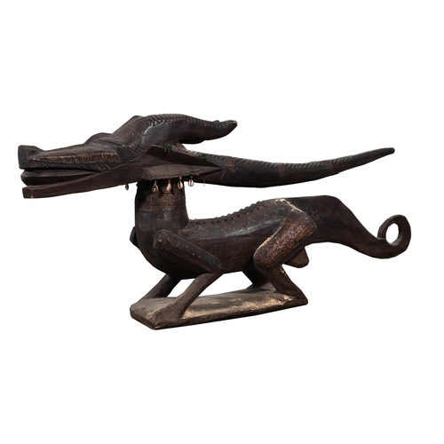 709 - A LARGE PAIR OF CARVED WOODEN DRAGONS20TH CENTURY approximately 64cm high, 148cm long, 28cm wide, th... 