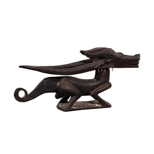 709 - A LARGE PAIR OF CARVED WOODEN DRAGONS20TH CENTURY approximately 64cm high, 148cm long, 28cm wide, th... 