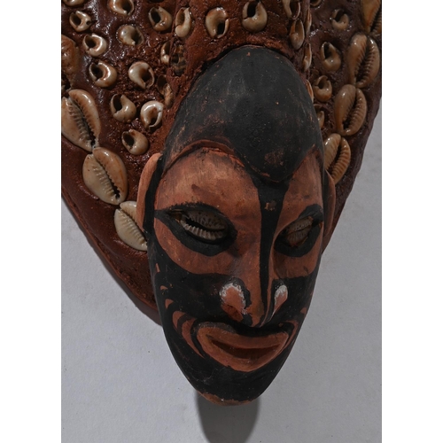 726 - A GROUP OF THREE LARGE TRIBAL MASKS 20TH CENTURY One freestanding and carved wood approximately 105c... 